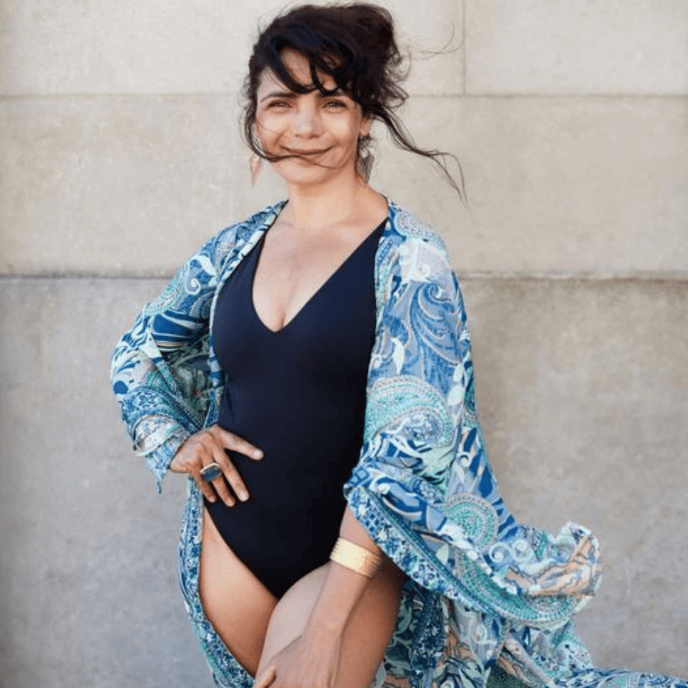 Woman in swimsuit and cover-up, Aug 16 screenshot