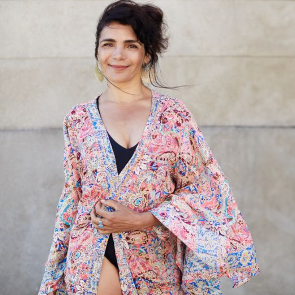 Woman in floral kimono, screenshot from August 16, 2025.