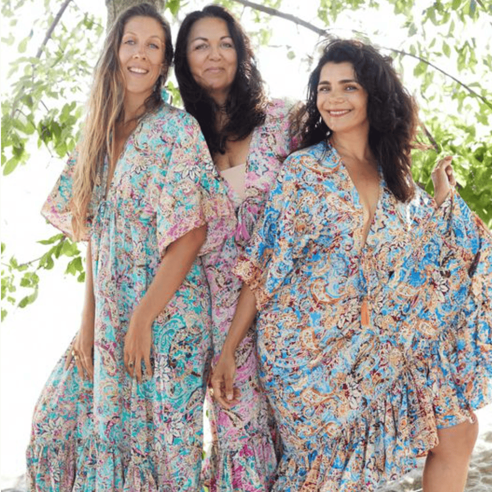 Three women in floral dresses, August 16, 2025 screenshot