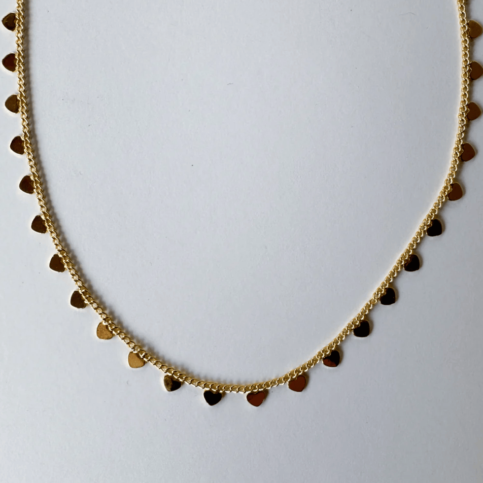 Gold heart charm necklace, screenshot August 22, 2025.