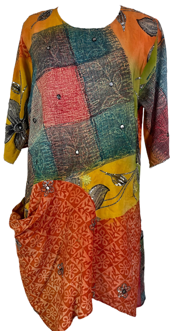 Colorful patchwork tunic, screenshot from August 27, 2025