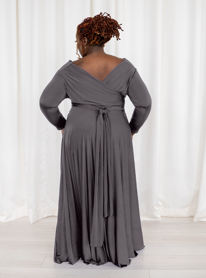 Woman in gray wrap dress, screenshot from September 6, 2025.