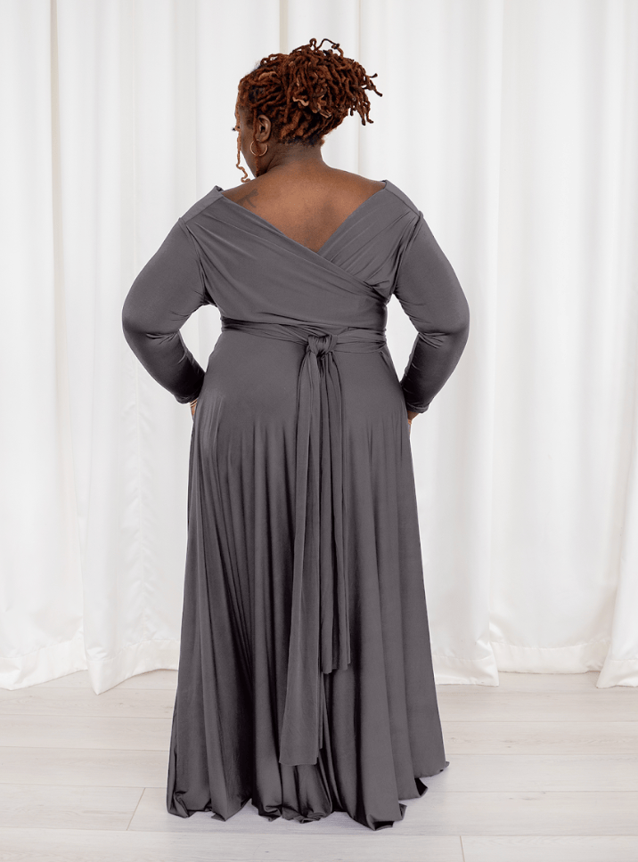 Woman in gray wrap dress, screenshot from September 6, 2025.