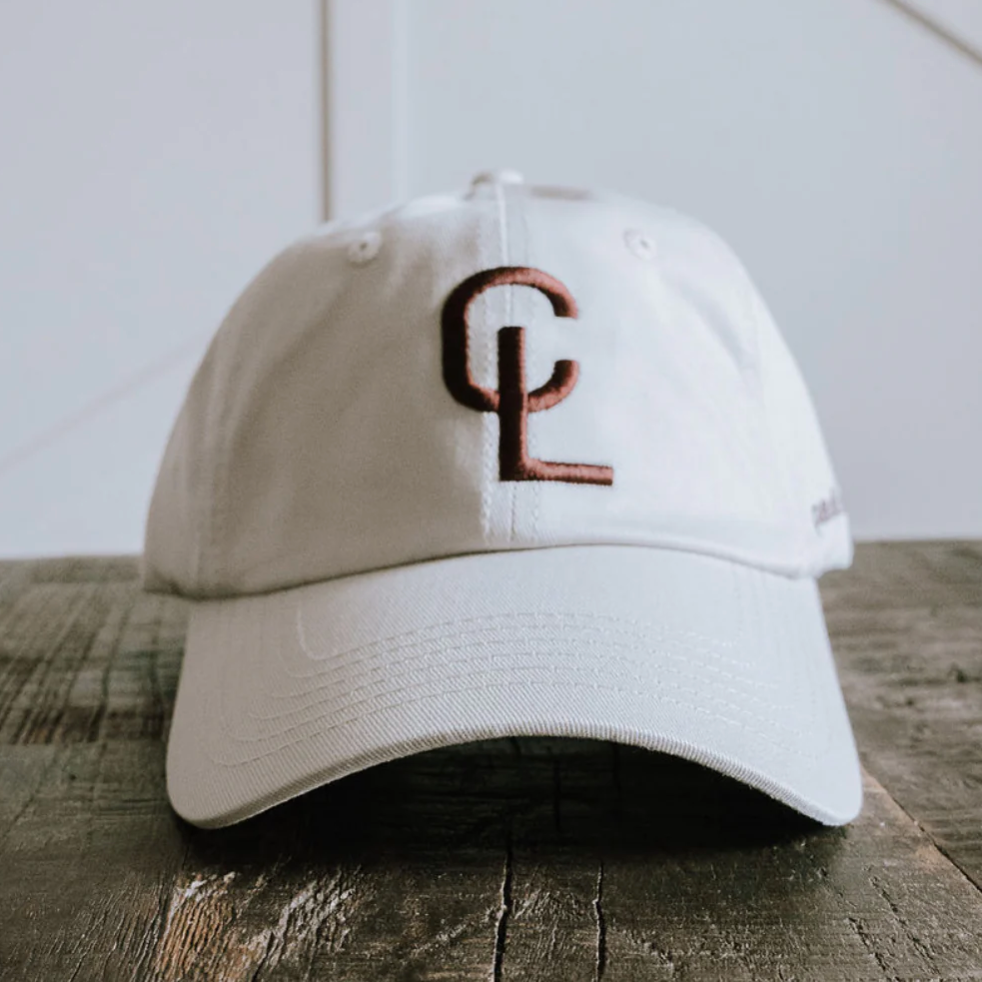 White baseball cap with CL logo, screenshot from 2025-09-12.