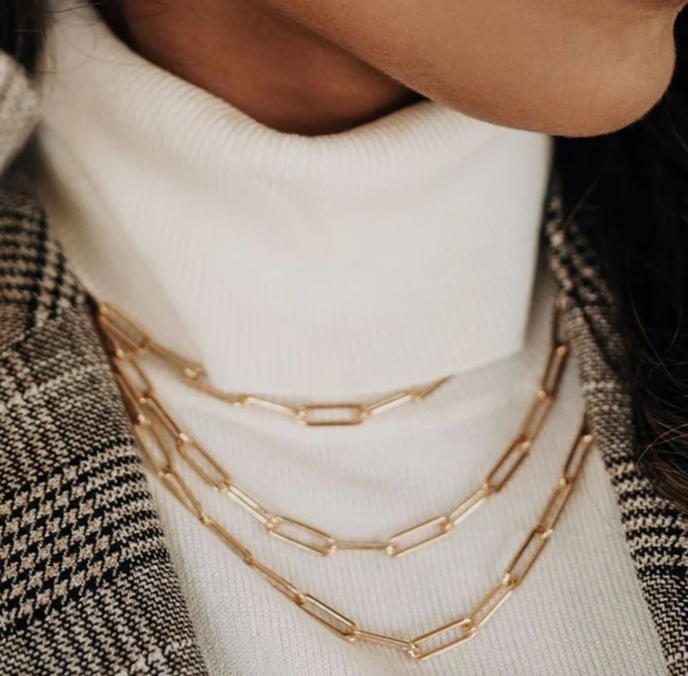 Gold layered chain necklaces screenshot, September 15, 2025.