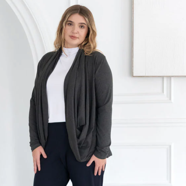 Woman in gray cardigan, screenshot from Sept 16, 2025.