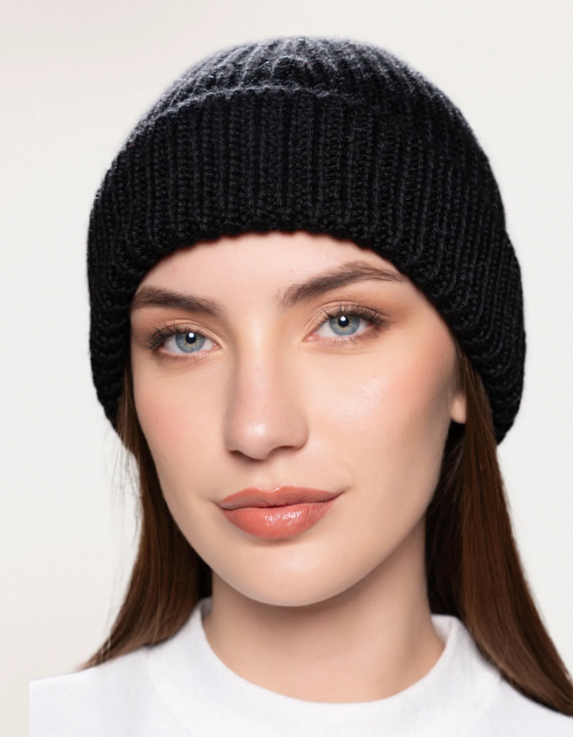 Woman wearing black beanie - Screenshot 2025-09-15